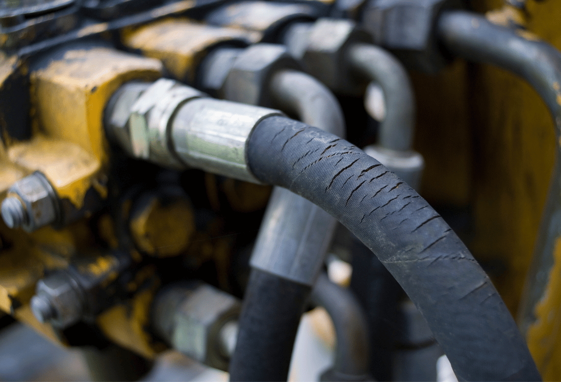 Hydraulic hoses being used on a piece of equipment.