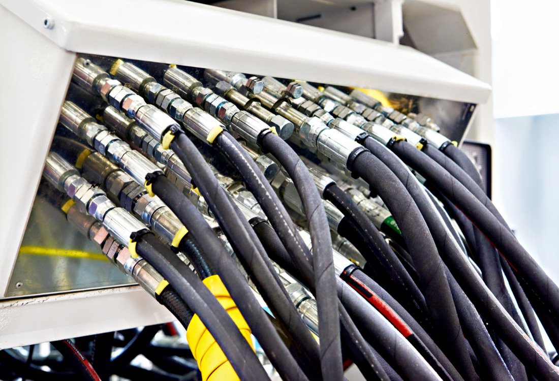 Perfectly connected hydraulic hose protection for enhanced durability and safety.